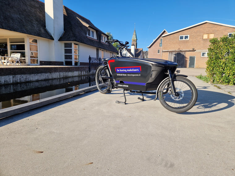 De Koning Makelaars — bakfietsbestickering — Voertuigbelettering & wrapping
